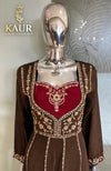 Anarkali dress neckline and gold-tone embellishment close-up