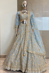 Actual powder-blue bead work lehenga choli on mannequin