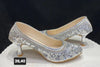 Silver heels with gold stone