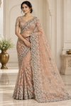 Party wear Net Saree — Peach model photo