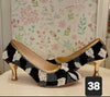 Black n white pearl heel
